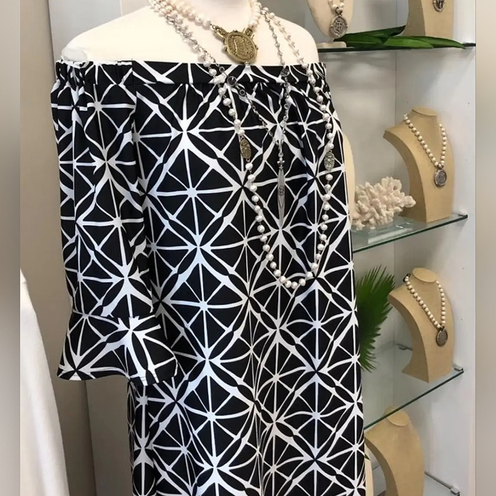 Jude Connally off shoulder dress